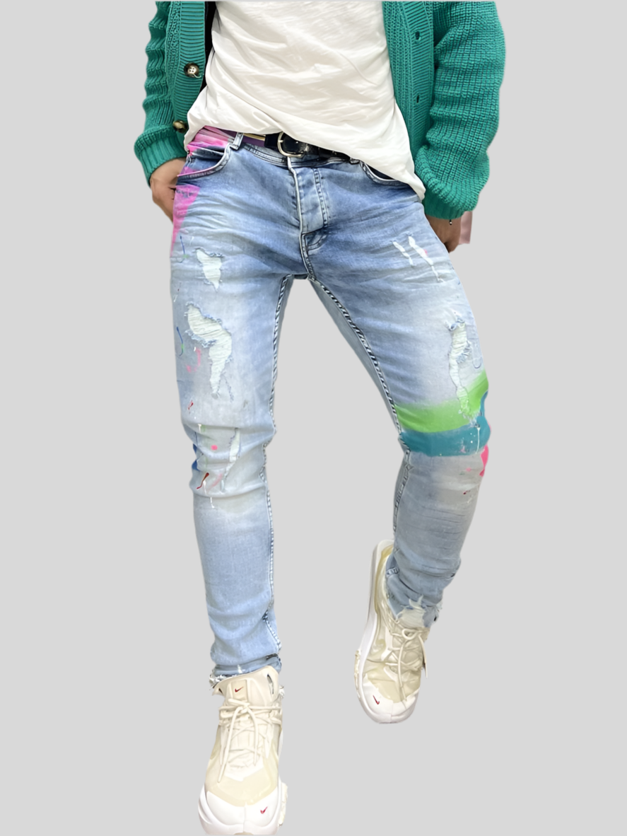 JEANS MINIMAL CON SCHIZZI COLORATI E ROTTURE