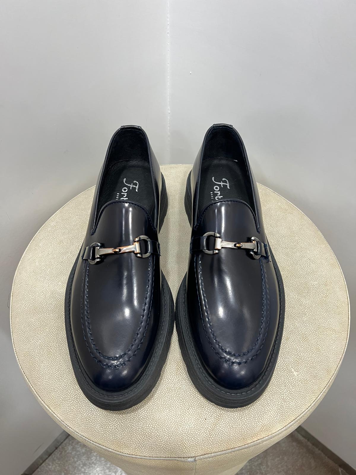 Mocassino placchetta fondo roccia